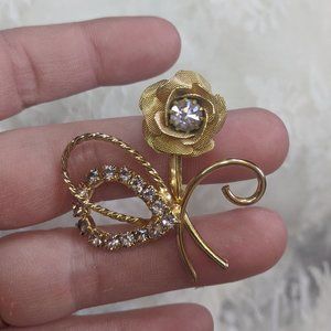 VTG goldtone purple rhinestone flower brooch pin
